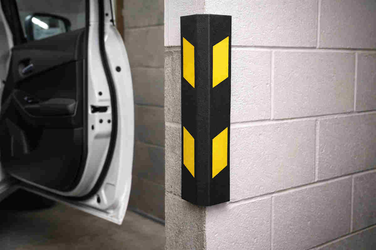 Rubber corner guard installed on garage wall corner
